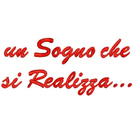 Ricamo con frase "Un sogno che si realizza..."